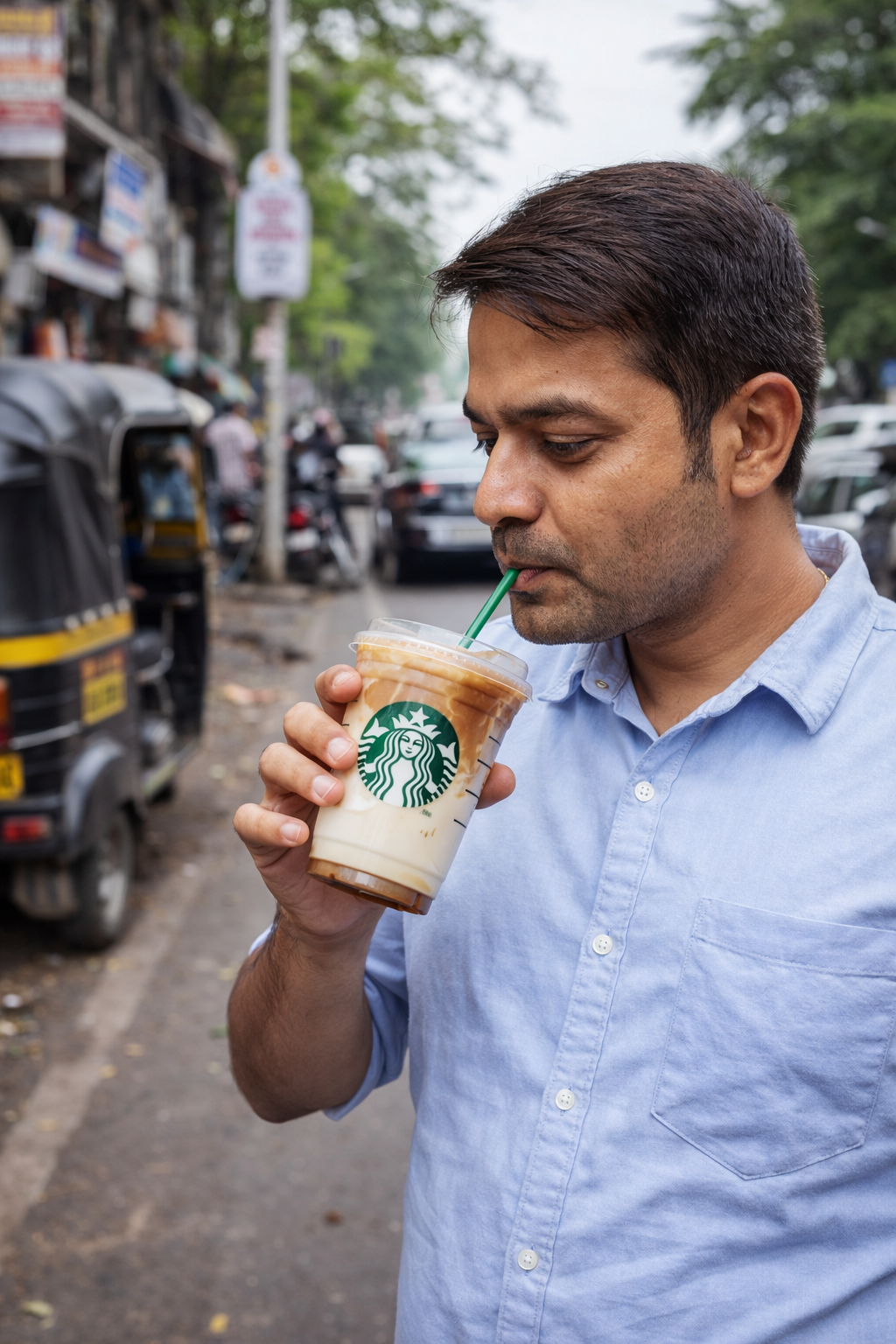 Man drinks Starbuck coffee