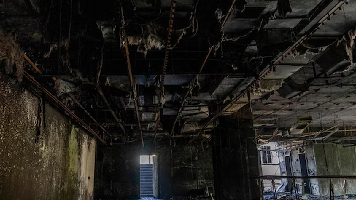 The burned-out interior of a media office in Dhaka